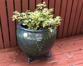 There are four of these matching huge glazed pots