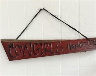 "COWGIRLS HANGOUT" SIGN
