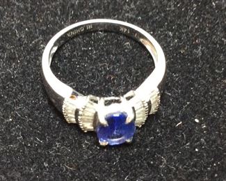 14KT GOLD PURPLE CENTER STONE 2.5G SIZE 6.5