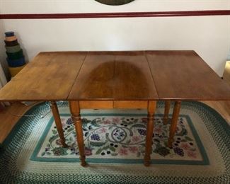Willet beryl maple table, without leaves it is 42" long expands up to 96" with 3 leaves.  40 " Wide