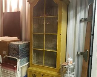IN STORAGE! Kittinger mustard colored single door lighted display cabinet with 2 drawers. Available to see by appointment after sale.