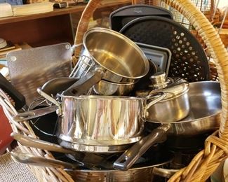 Pots and pans in antique basket.