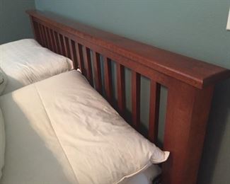 Queen size Mission style bed.
