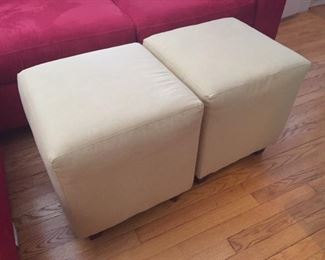 Pair of small ottomans.