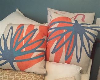 Large selection of colorful pillows.