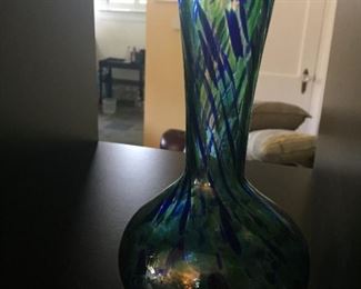 Iridiscent blue and green glass vase.
