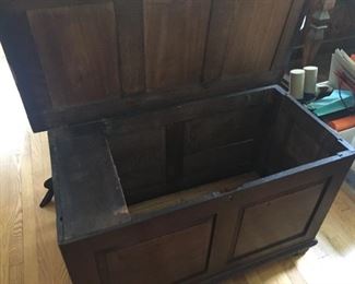 Antique wooden chest from England with inside drawer.