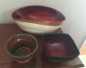 Handmade ceramic pieces, one from Murano.