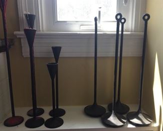 Wrought iron candle holders and stands.