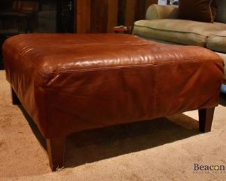 Leather cocktail ottoman