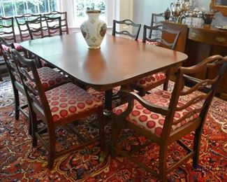 Double pedestal mahogany dining table and 13 chairs