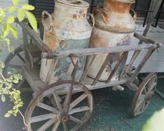Great for a rustic setting :Wooden Wagon with milk cans