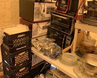 Microwaves, brand new white plates, silverware, toasters