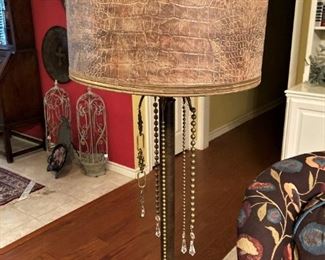 Lamp with good-looking embossed shade