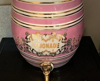 Dark pink, white, and gold vintage lemonade dispenser