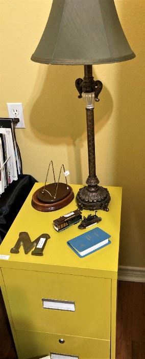 Yellow file cabinet; lamp