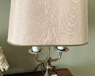 Brass lamp on marble base