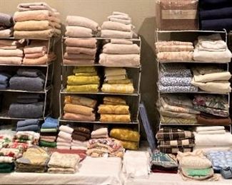 Lots of towels, sheets, placemats, napkins, etc.