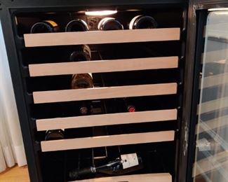 Wine cooler-holds all of the wine at controlled temps.  Purchase for a fraction of retail.  Use as a built in, stand alone or under the counter. 