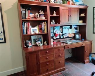 a wall of Ethan Allen!  Drawers to store, bookcase in the first unit, pull out drawer for keyboard and computer set up in the second.  Buy one unit or both