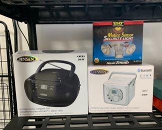 Compactors player, and a Bluetooth portable music system. New open box.