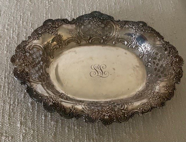 15"x11.5"x2" Sterling Silver Platter marked Tiffany&Co. on the back 11283 Makers 5605 925-1000 T. Platter weighs 964 grams. You can see the coloration shows aging. and the this platter is ornate. Item has a reserve.