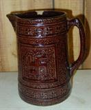 Stoneware Pitcher With Swatiskas