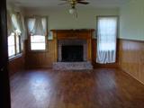 Livingroom w/Hardwood Floors and Fireplace