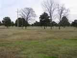 Located On The Corner Of Burnett Lane & Hwy 59