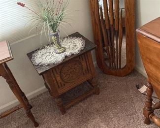 Very nice small ( teakwood ) carved side table. Door opens for storage.  $ 65.00