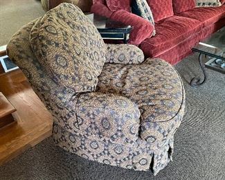 Upholstered swivel rocker