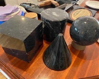4 heavy black marble decorative shapes. Approximately 8" each.