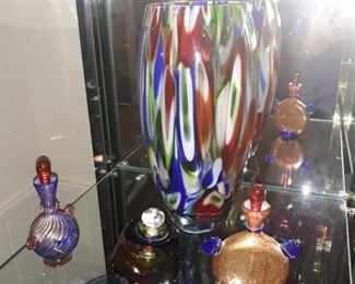 Featuring  a variety  of perfume  bottles