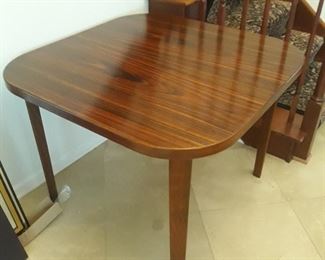 Danish modern Rosewood
40" x 40"  with two leaves