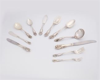 1005
A Wallace "Sir Christopher" Sterling Silver Flatware Service
20th Century
Each marked: Wallace / Sterling
Designed 1936 by William S. Warren, comprising 7 hollow-handled Modern place knives (9.125"), 1 master butter server (7.75"), 2 hollow-handled butter spreaders (6.25"), 6 butter spreaders (6.25"), 1 salad fork (6.375"), 8 cocktail forks (5.5"), 1 teaspoon (6"), 3 cream soup spoons (6"), 1 gravy ladle (6.375"), 1 cold meat serving fork (8"), and 1 table/serving spoon (8.5"), 32 pieces
Weighable sterling: 27.745 oz. troy approximately
Estimate: $600 - $800