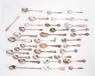1007
A Group Of Silver Souvenir Flatware
Late 19th/20th Century
Various makers
Comprising variously patterned teaspoons and demitasse spoons, primarily souvenir and collector's spoons, and one cocktail fork, 35 pieces
Largest: 7.25" L
15.72 gross oz. troy approximately
Estimate: $300 - $500