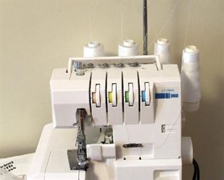 Baby Lock Surger, Model BL302, Includes Foot Pedal Controls, And Instruction Booklets