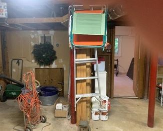 Folding chairs, ladder, galvanized wash tub and other miscellaneous shop items.