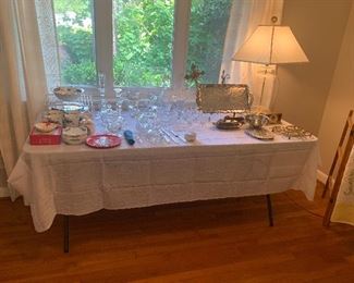 Miscellaneous glassware and Johnson Brothers Victorian Christmas China. Silverplate items included at end of table.