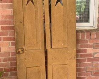 Folk art style hinged door.