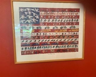 Flag style wall art. Artist is Woodie Long, numbered 51/550.