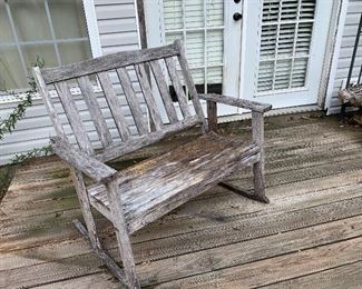 Outdoor wood rocking bench