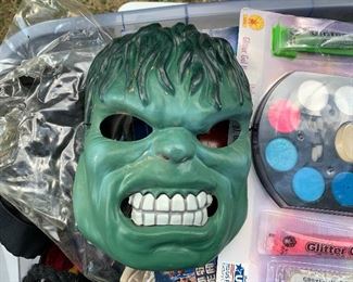 Tote full of Halloween costumes and make up