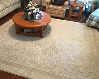 Round coffee table w/2 end tables $175, large area rug $150