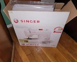Brand new singer sewing machine in the Box
