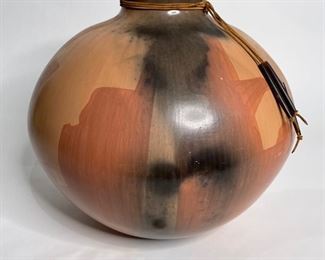 Native American Pottery with Horn Tassels Signed 1291	12.5in H x 12in Diameter	
