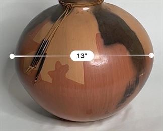 Native American Pottery with Horn Tassels Signed 1291	12.5in H x 12in Diameter	
