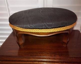 Small Black Upholstered Footstool with Double Braided Gold Trim