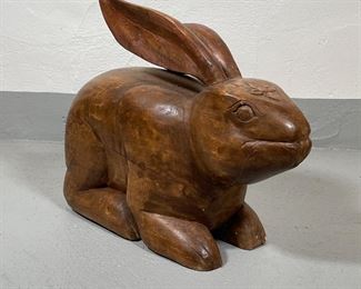 LARGE CARVED WOOD RABBIT | Folk art carved bunny rabbit! With long ears, traces of old red paint, having a carved flower on the forehead; h. 15 x l. 18 in. 