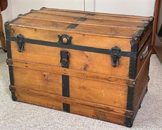 BOUND WOOD STORAGE CHEST | Antique, late 19th century, with leather handles; appears to be in very good condition; h. 33-1/2 x w. 34 x d. 21 in. 